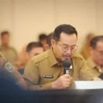 Wakil Bupati Muba Kyai Abdur Rohman Husen saat memaparkan langkah konkret pengendalian inflasi dalam Rakor TPID Sumsel.