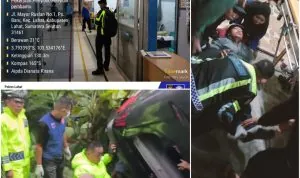 Petugas Satlantas Polres Lahat melakukan evakuasi korban kecelakaan bus PO Al-Hijrah yang masuk jurang di Desa Sugihwaras.