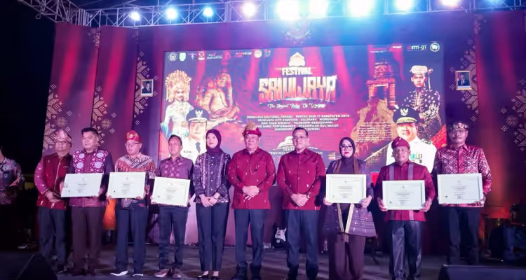 Ketua TP PKK Muba Hj Patimah Toha saat menghadiri pembukaan Festival Sriwijaya XXXIV Tahun 2026 di Palembang.