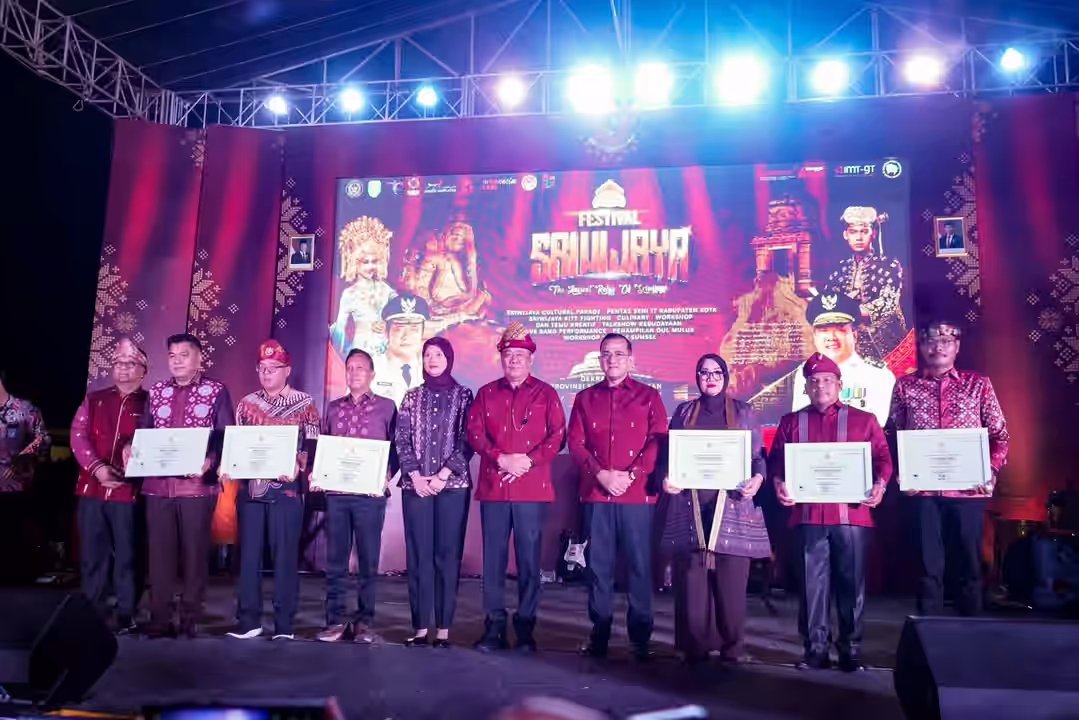 Ketua TP PKK Muba Hj Patimah Toha saat menghadiri pembukaan Festival Sriwijaya XXXIV Tahun 2026 di Palembang.