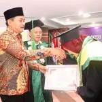 Wakil Bupati Muba Abdur Rohman Husen saat menghadiri Wisuda II STEI Sekayu di Auditorium Pemkab.