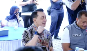 Wakil Ketua DPRD Sumsel H Nopianto tersenyum saat menghadiri sebuah acara formal di Palembang.